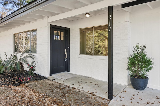 property entrance with a porch