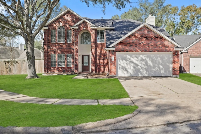 front facade featuring a garage and a front lawn