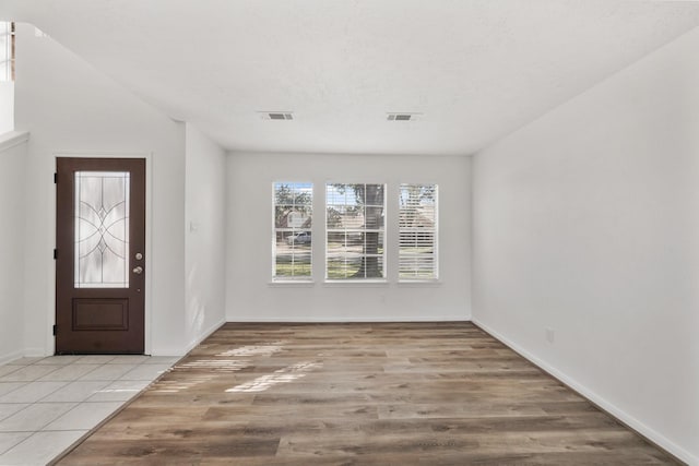 entrance foyer with light hardwood / wood-style floors