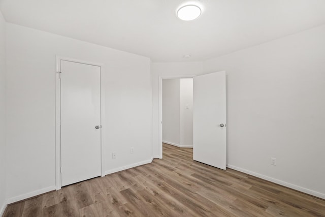 unfurnished bedroom featuring light hardwood / wood-style flooring