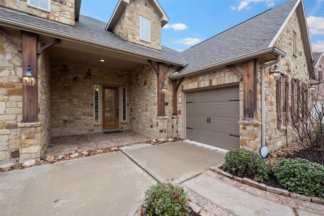 view of front of property featuring a garage