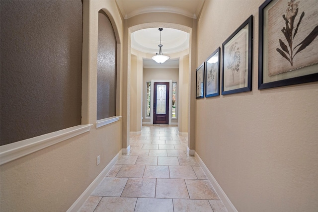 doorway featuring ornamental molding