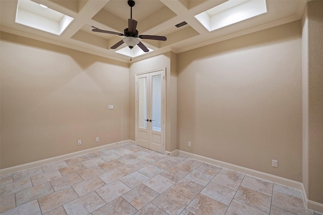 spare room featuring visible vents, baseboards, coffered ceiling, a ceiling fan, and crown molding