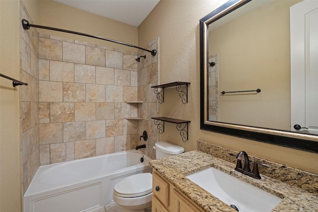 full bathroom with toilet, shower / bath combination, a textured wall, and vanity