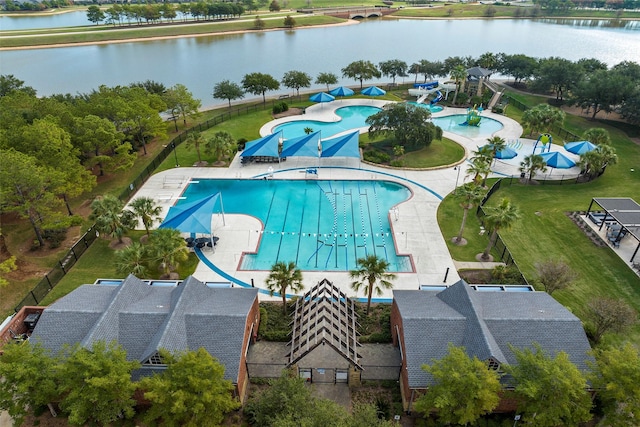 birds eye view of property with a water view