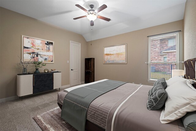 carpeted bedroom featuring ceiling fan and lofted ceiling