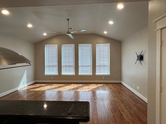 interior space with vaulted ceiling, plenty of natural light, and ceiling fan