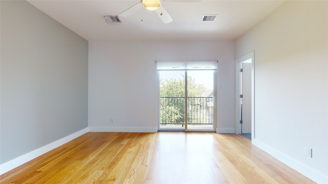 unfurnished room with ceiling fan and light hardwood / wood-style flooring