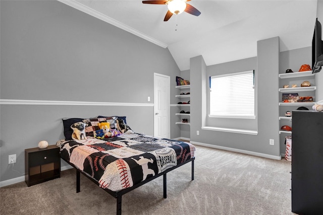 carpeted bedroom featuring ceiling fan, crown molding, and lofted ceiling