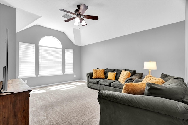 carpeted living room with ceiling fan, a healthy amount of sunlight, and lofted ceiling