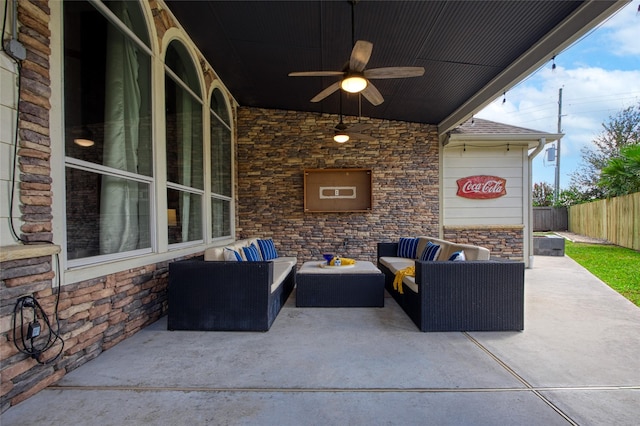 view of patio / terrace featuring an outdoor living space and ceiling fan