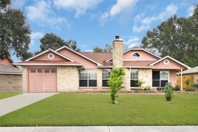 ranch-style house with a garage and a front yard