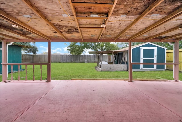 view of patio / terrace featuring a storage unit