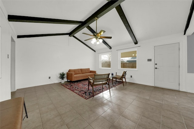 tiled living room featuring ceiling fan and lofted ceiling with beams