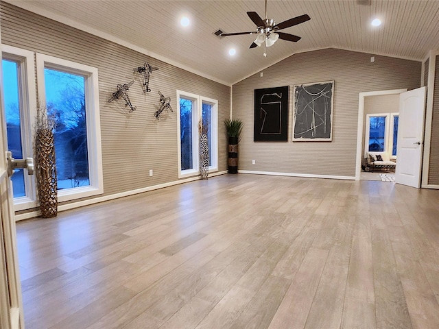 spare room featuring ceiling fan, light hardwood / wood-style flooring, lofted ceiling, and wood ceiling