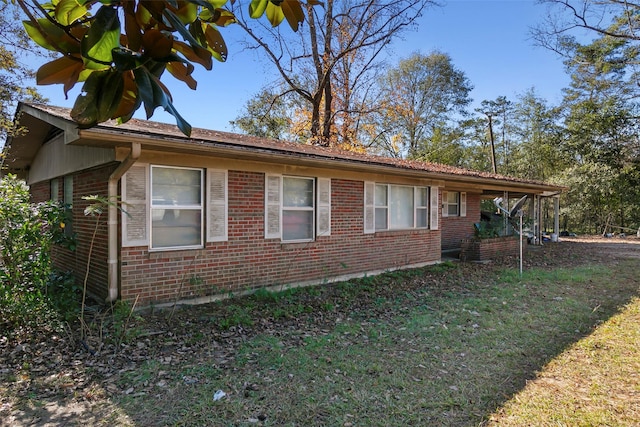 view of home's exterior featuring a yard