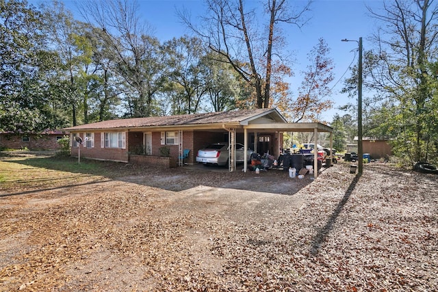 exterior space with a carport