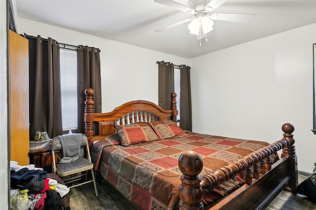 bedroom with ceiling fan and hardwood / wood-style floors