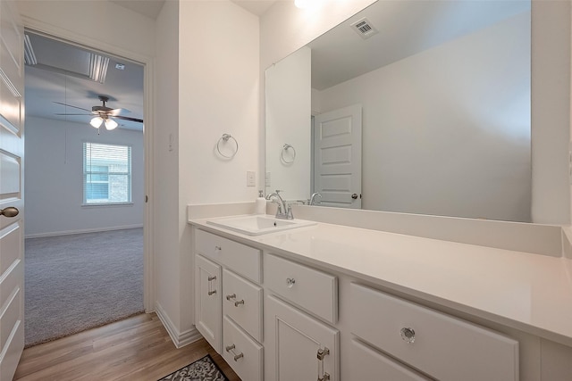 bathroom featuring vanity and wood-type flooring