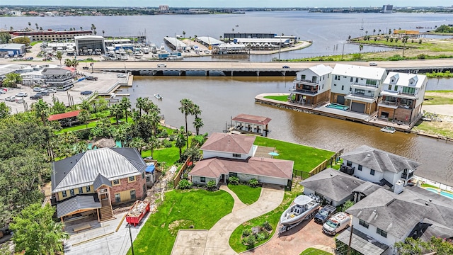 drone / aerial view with a water view