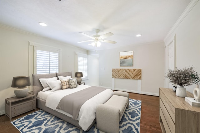 bedroom featuring dark hardwood / wood-style floors, ceiling fan, and ornamental molding