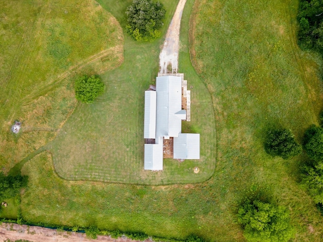 birds eye view of property with a rural view