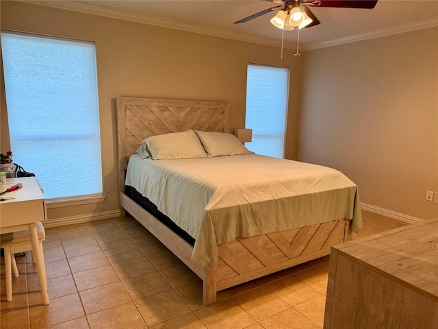 bedroom featuring ceiling fan, light tile patterned floors, and ornamental molding