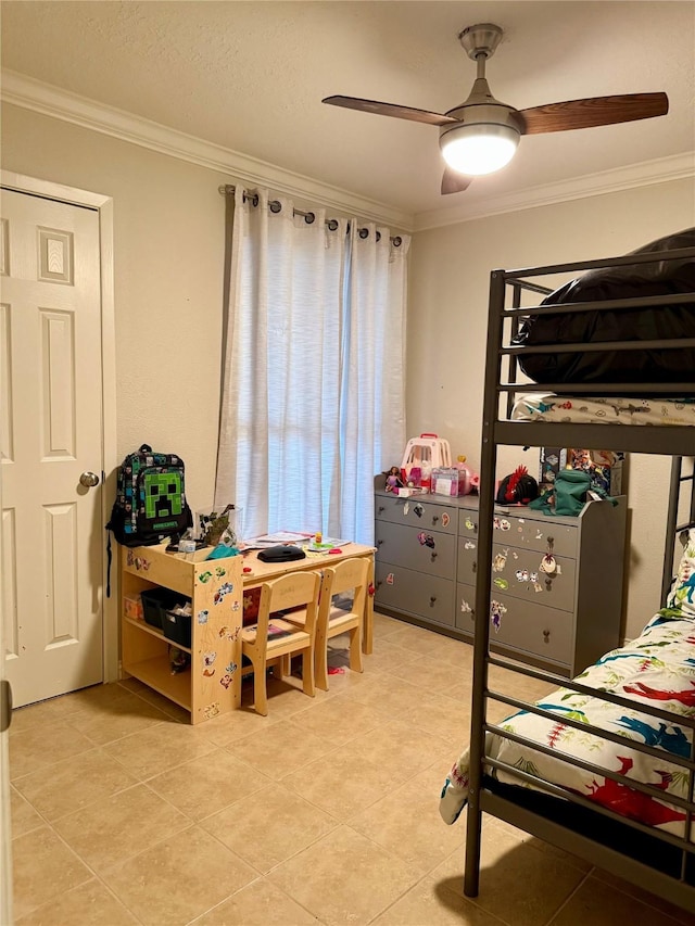 bedroom with ceiling fan and ornamental molding