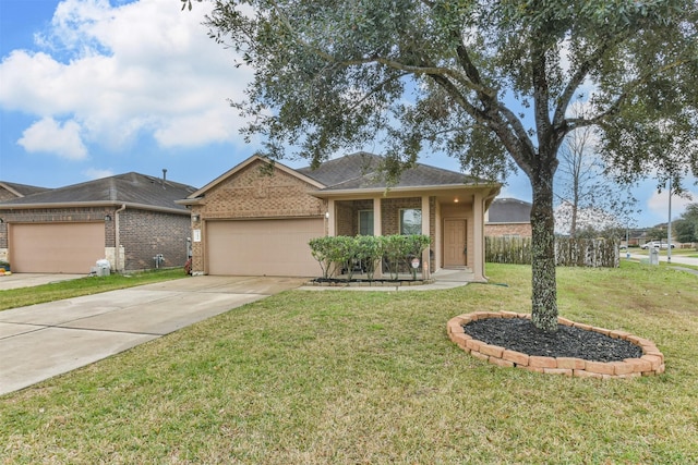 single story home featuring a garage and a front yard