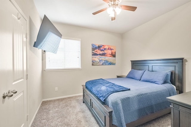 bedroom with light colored carpet and ceiling fan