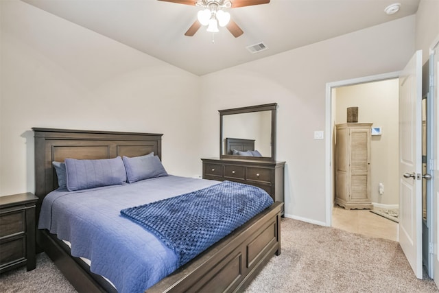 bedroom with light carpet and ceiling fan