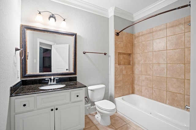 full bathroom with tiled shower / bath combo, tile patterned floors, toilet, vanity, and ornamental molding