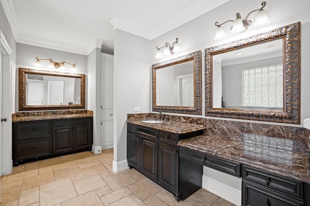 bathroom featuring vanity and ornamental molding