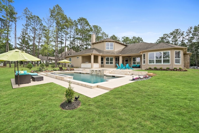 back of house with outdoor lounge area, a patio area, and a yard