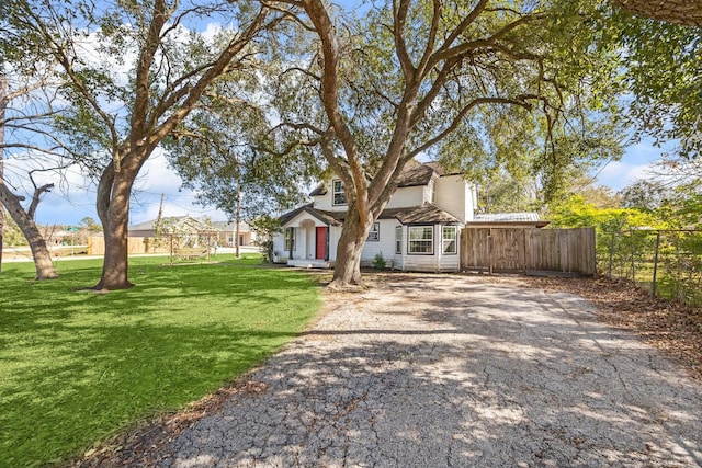 front of property featuring a front yard