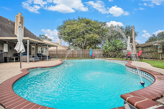 view of pool featuring an outdoor hangout area, a patio area, ceiling fan, and pool water feature