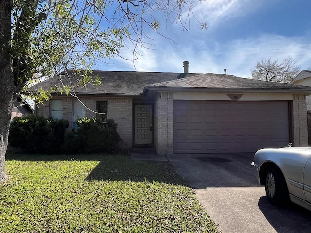 ranch-style home with a front yard and a garage