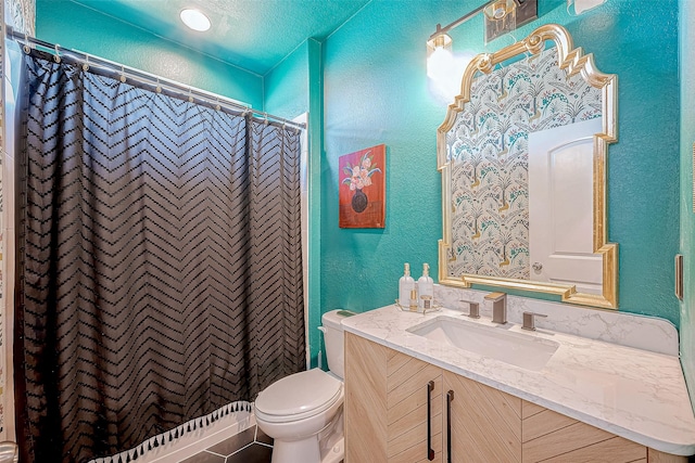 bathroom with walk in shower, vanity, a textured ceiling, and toilet