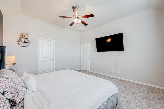 carpeted bedroom with ceiling fan and lofted ceiling