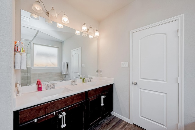 bathroom with vanity and wood-type flooring