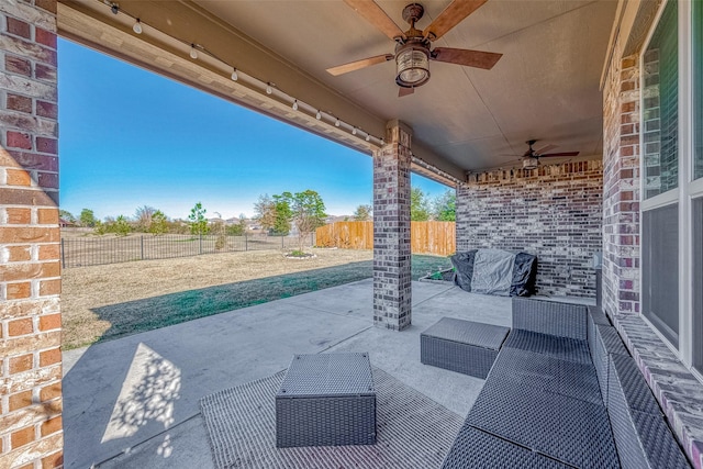 view of patio / terrace featuring ceiling fan