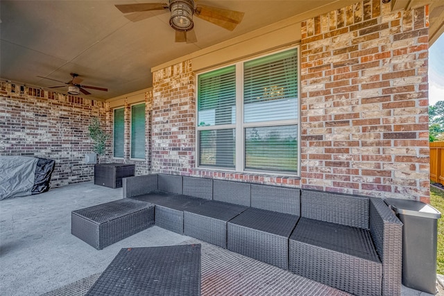 view of patio featuring an outdoor living space and ceiling fan