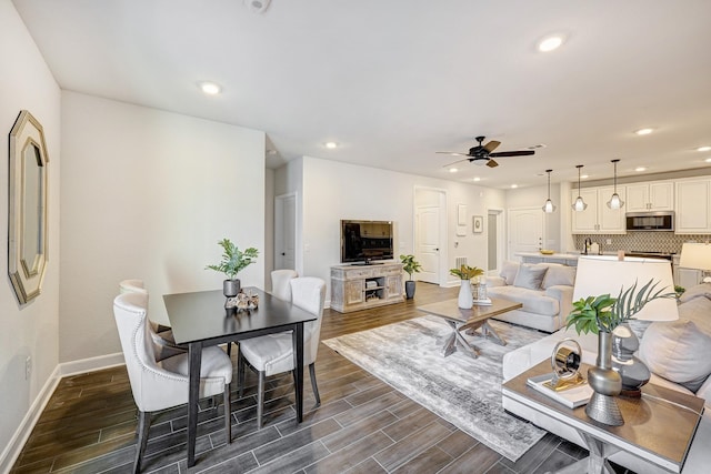 living room featuring ceiling fan