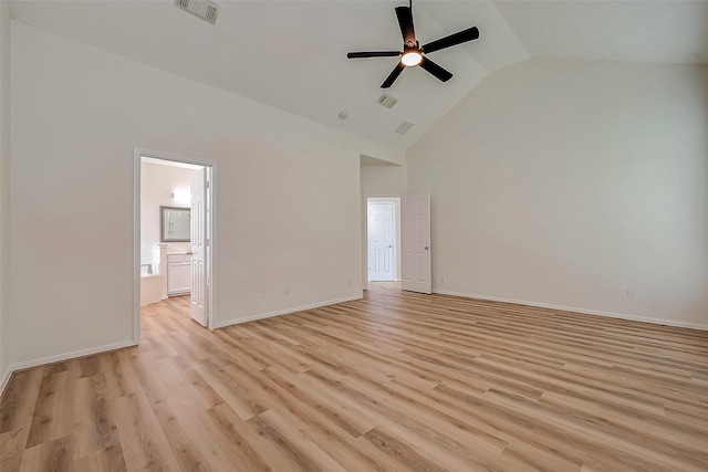 interior space featuring ensuite bath, ceiling fan, high vaulted ceiling, and light hardwood / wood-style floors