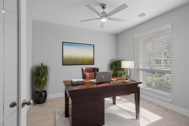 office space with ceiling fan and light hardwood / wood-style flooring