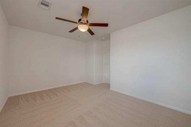 unfurnished room with carpet flooring and ceiling fan