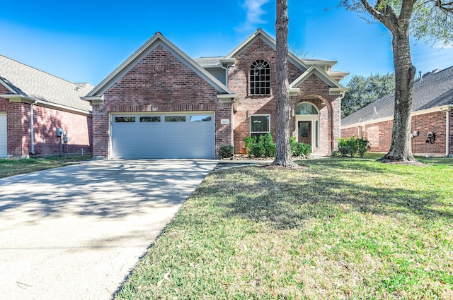 front of property with a garage and a front yard