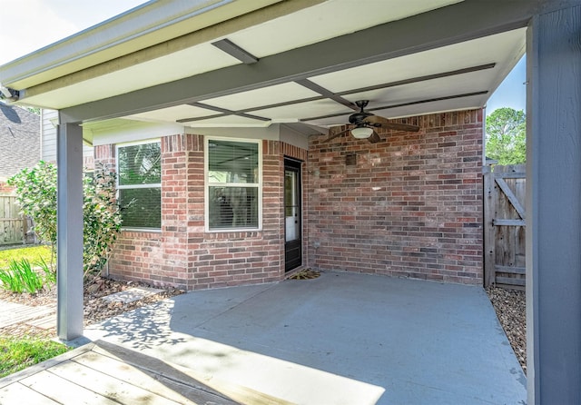 view of patio featuring ceiling fan