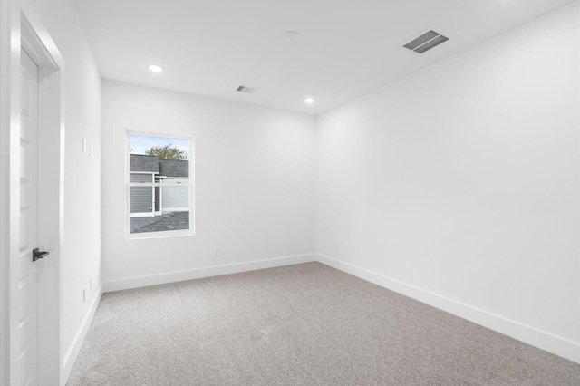 unfurnished room with carpet flooring