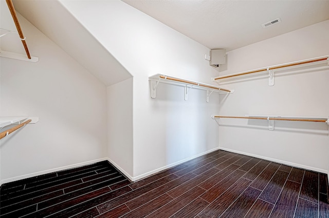 spacious closet with hardwood / wood-style floors